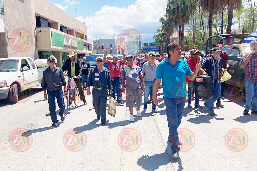 Marchan ex obreros en apoyo a reforma judicial